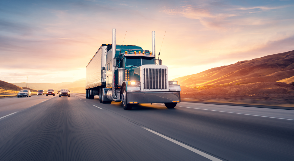 truck driving down a highway