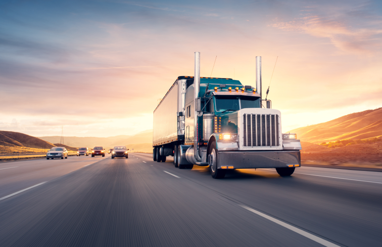 truck driving down a highway